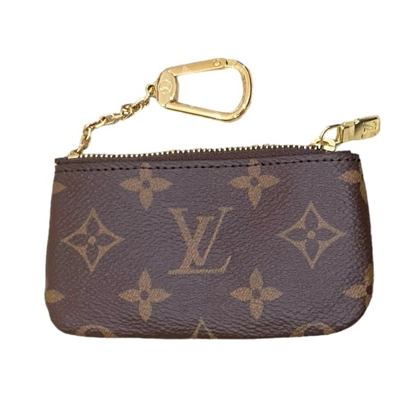 Louis Vuitton Handbags - NWT Louis Vuitton leather zippered coin purse gold-tone clasp box & bag marked